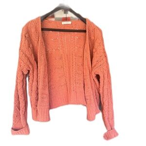 Open knitted sweater